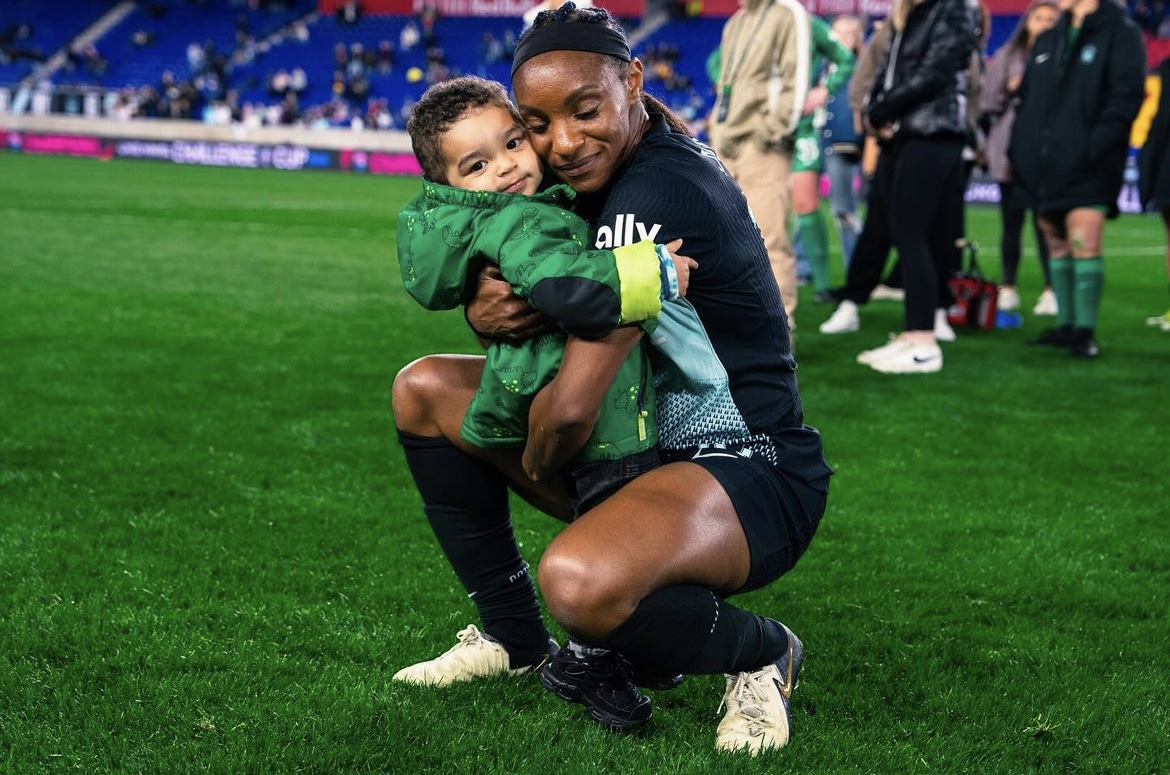Crystal Dunn, soccer player and her son
