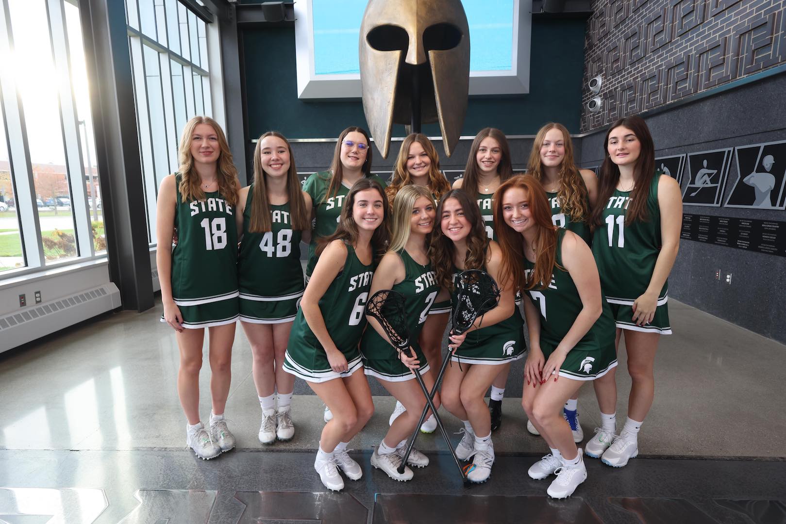 Womens LAX MSU_indooor in uniform women's lacrosse