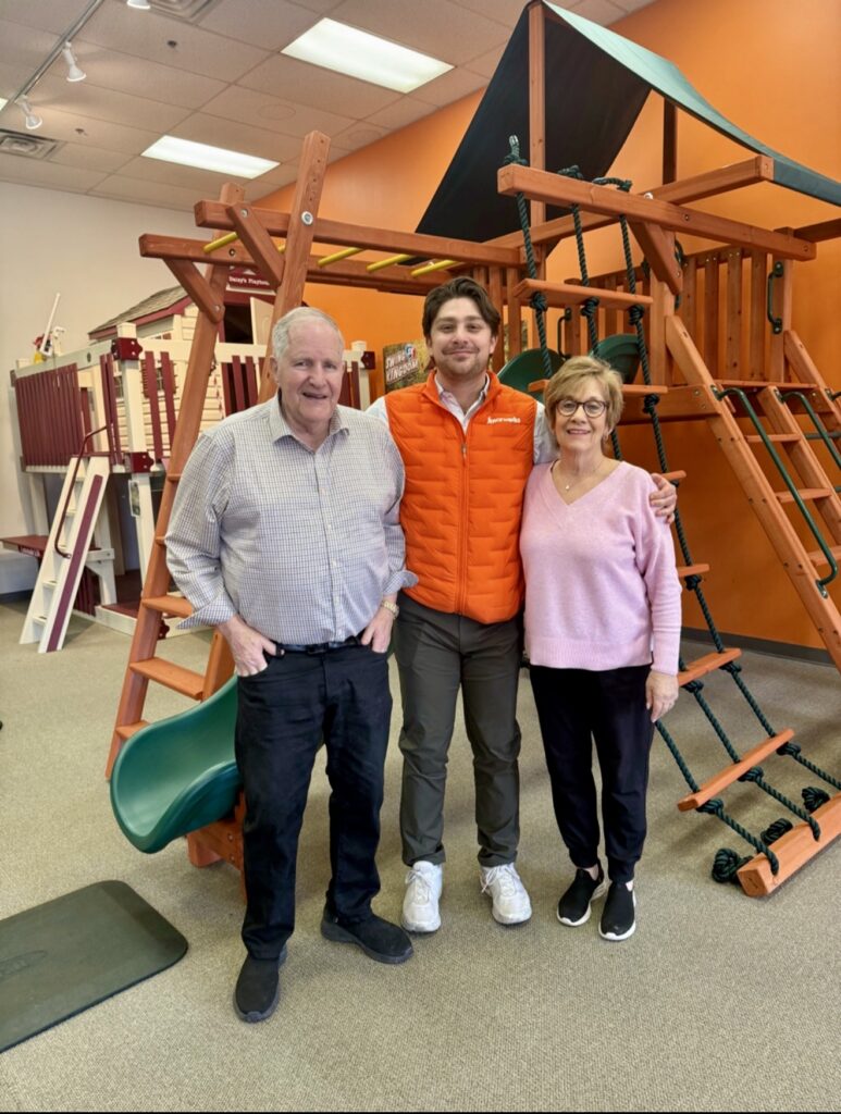 Jake Stotter with grandparents at Fenceworks
