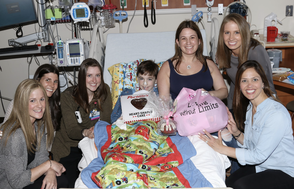 loving without limits founder andrea bialk helps assemble care bags for mothers who are caring for a sick child in the hosptial.