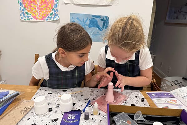 Two girls crafting