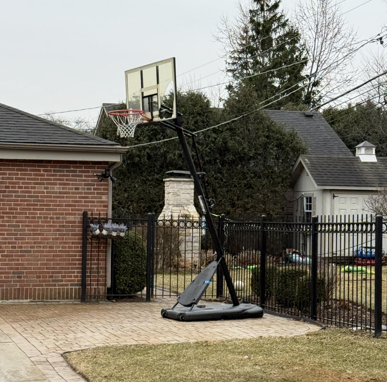 portable basketball hoop showing signs of age and wear