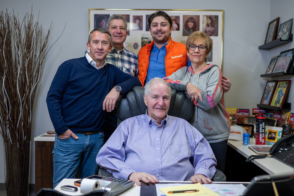 Fenceworks family team in the Northbrook showroom serving Chicago's North Shore families