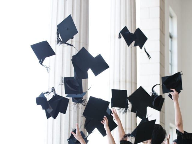 throwing graduation hats