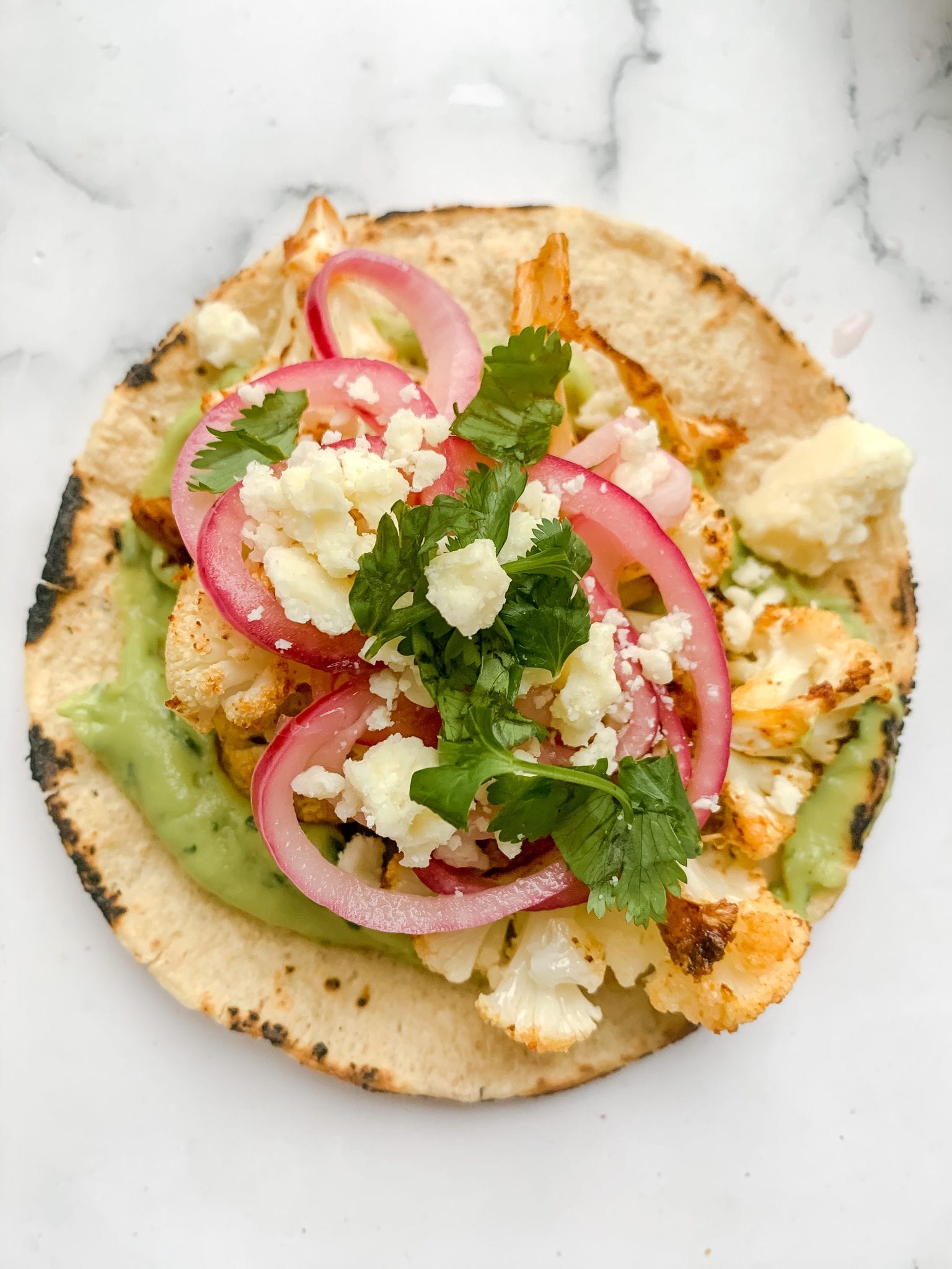 Roasted Cauliflower Tacos with Lime Avocado Crema