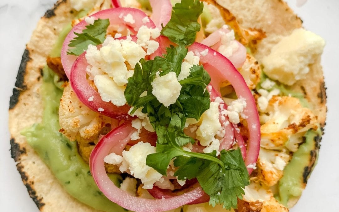 Roasted Cauliflower Tacos with Avocado Lime Crema